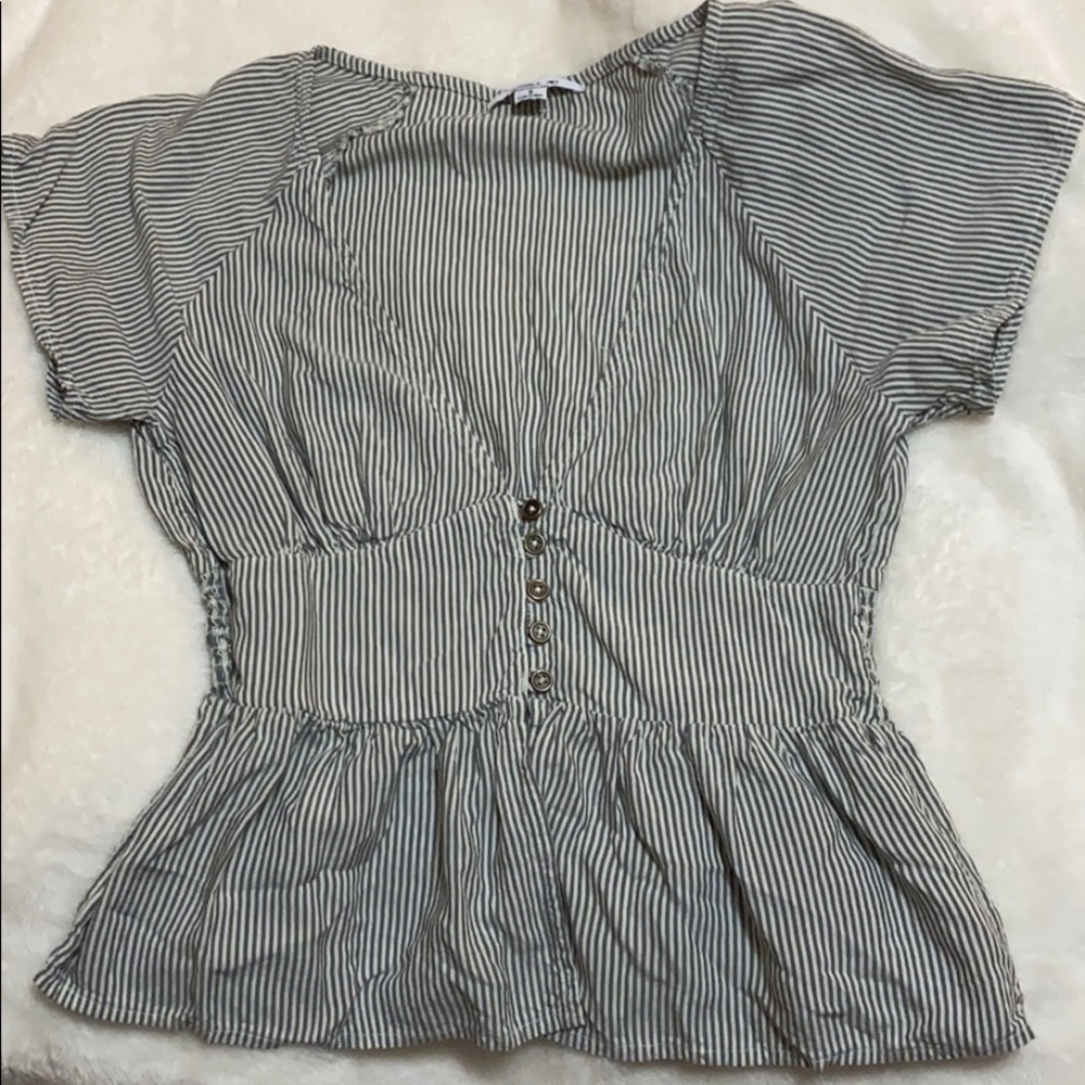 Deep plunging neck peplum top